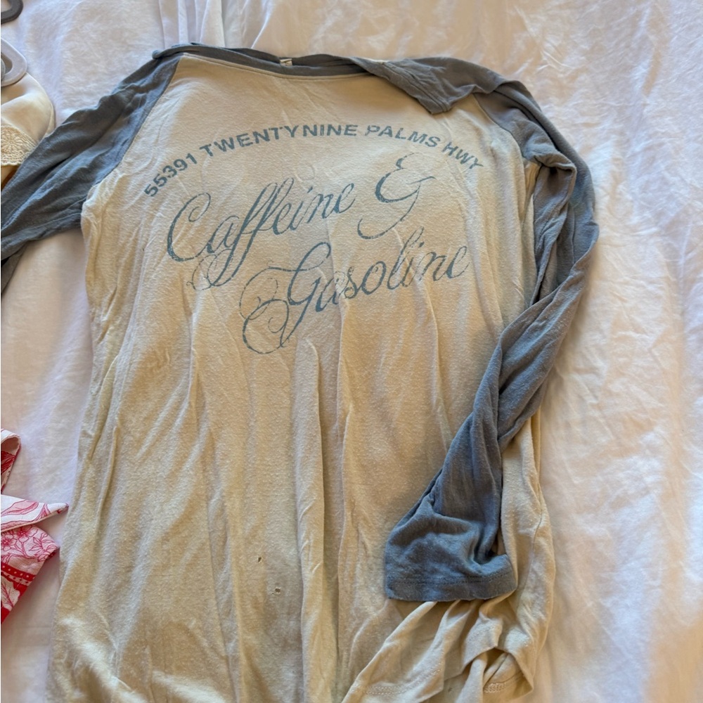 Spell long sleeve tee has a few little holes, see pics